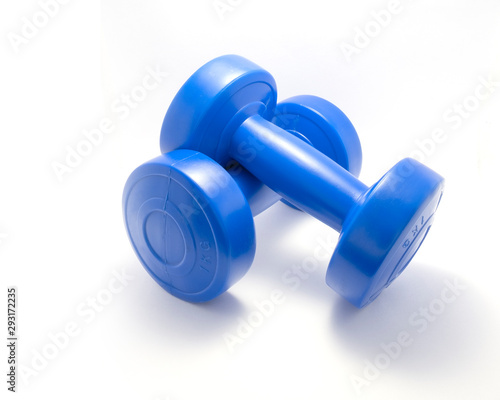 1 kilogram Exercise Dumbbells Crossed and Isolated on a White Background
