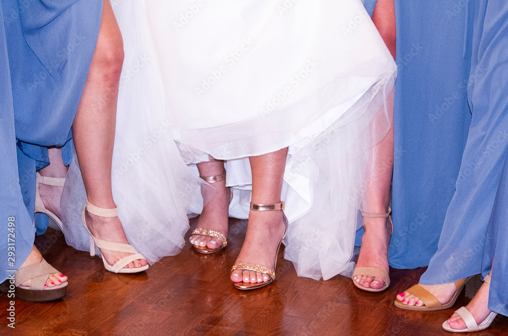 bride and bridesmaids in wedding shoes bride and bridesmaids in wedding shoes