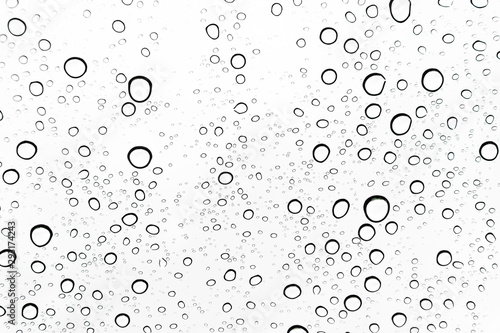 Rain drops on window glasses surface Natural Pattern of raindrops. Natural pattern of raindrops on white background for your design.