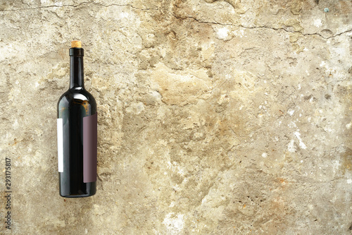 Bottle of wine on concrete background