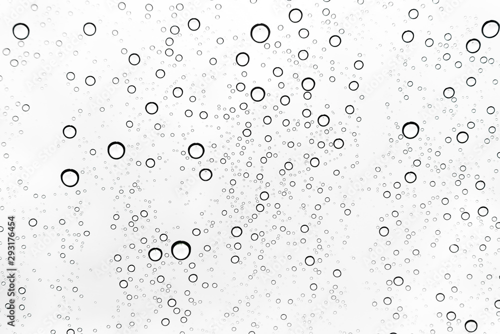 Rain drops on window glasses surface Natural Pattern of raindrops. Natural pattern of raindrops on white background for your design.