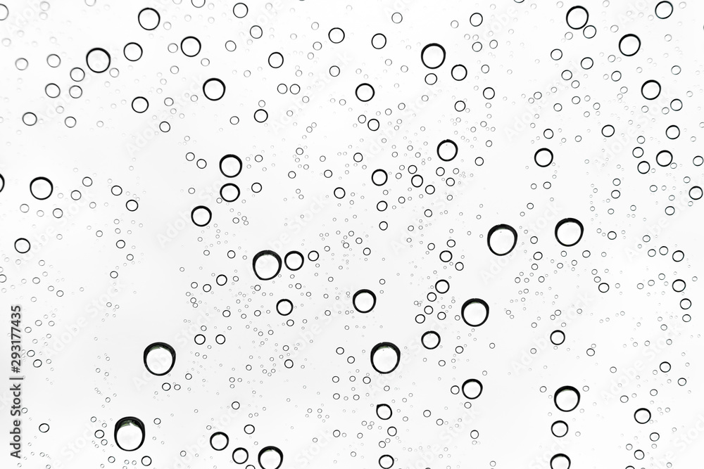 Rain drops on window glasses surface Natural Pattern of raindrops. Natural pattern of raindrops on white background for your design.