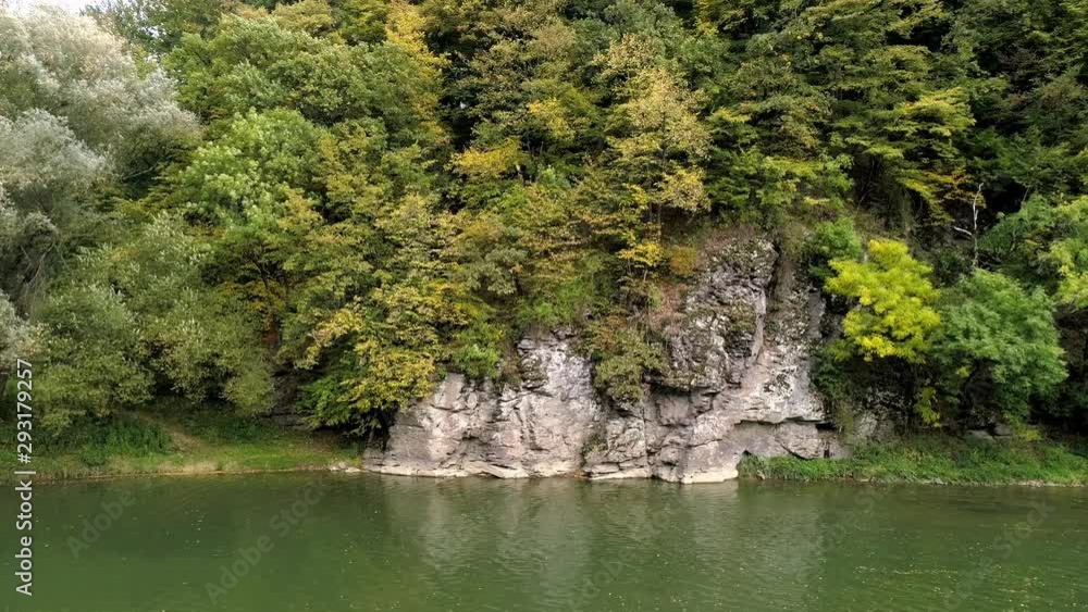 Mountain river and stone rock among the autumn forest. 4K video. Mountain river and stone rock among the autumn forest. 4K video.