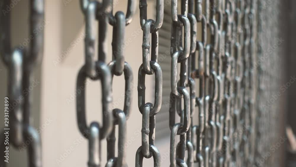 Chains hanging together as a decorative wall Chains hanging together as a decorative wall