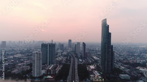 Wallpaper Mural 4K aerial drone footage of Bangkok skyline, Great sunset scene. Fantastic landscape. Business city, view of Bangkok downtown, Flying over Bangkok, Thailand. Torontodigital.ca