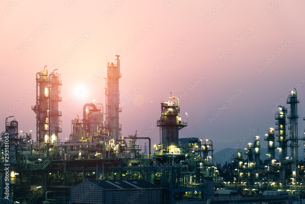 Factory of petroleum industrial plant on sunset sky background, Manufacturing of petrochemical plant, Oil and gas refinery industry