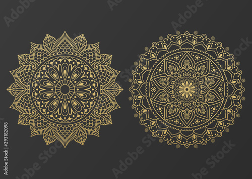 Fotografiet Logo icon ornamental mandala design in gold color