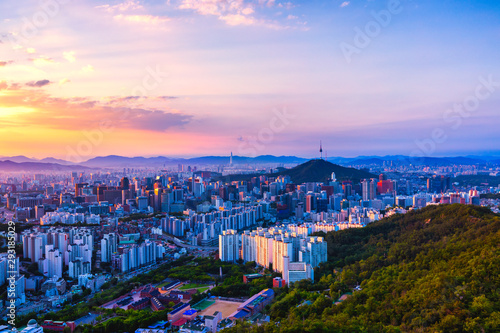 Fototapeta Naklejka Na Ścianę i Meble -  Sunrise and Skyline of Seoul downtown , Seoul Tower and lotte  Tower in Seoul,South Korea viewpoint from Ansan moutain.
