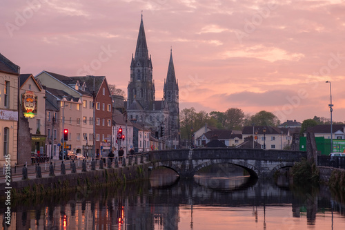 St. Finbarr Cathedral at sunset. Cork, Ireland. April 2019
