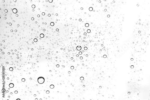 Rain drops on window glasses surface Natural Pattern of raindrops. Natural pattern of raindrops on white background for your design.