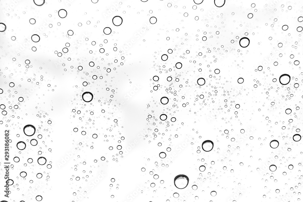Rain drops on window glasses surface Natural Pattern of raindrops. Natural pattern of raindrops on white background for your design. Rain drops on window glasses surface Natural Pattern of raindrops. Natural pattern of raindrops on white background for your design.