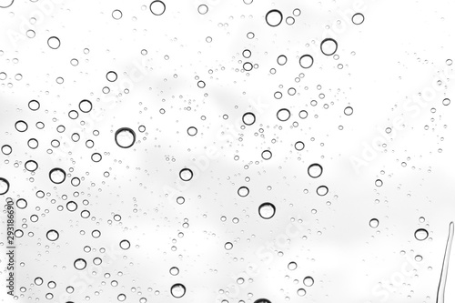 Rain drops on window glasses surface Natural Pattern of raindrops. Natural pattern of raindrops on white background for your design.