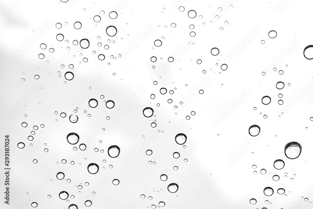 Rain drops on window glasses surface Natural Pattern of raindrops. Natural pattern of raindrops on white background for your design. Rain drops on window glasses surface Natural Pattern of raindrops. Natural pattern of raindrops on white background for your design.