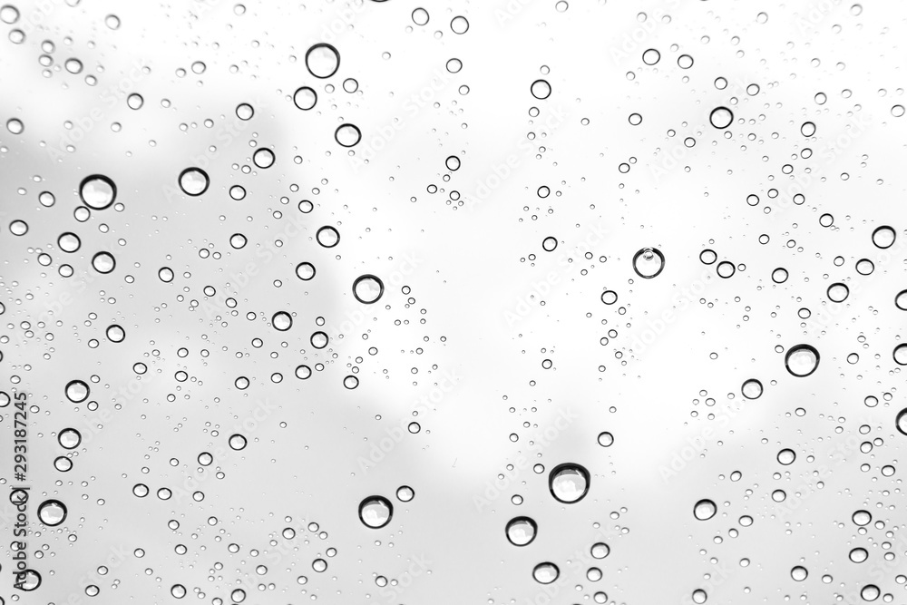 Rain drops on window glasses surface Natural Pattern of raindrops. Natural pattern of raindrops on white background for your design. Rain drops on window glasses surface Natural Pattern of raindrops. Natural pattern of raindrops on white background for your design.