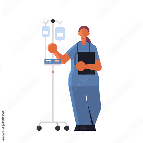female doctor anesthesiologist in uniform holding dropper medicine healthcare concept hospital medical clinic worker with stethoscope full length white background flat