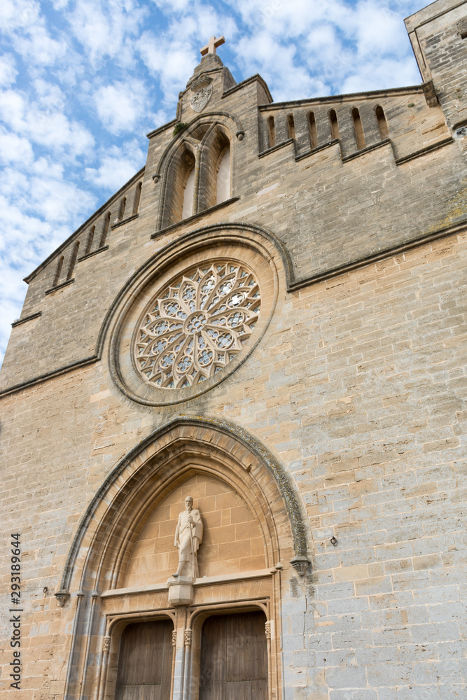 The building of the Catholic Church in Alcudia in Mallorca The building of the Catholic Church in Alcudia in Mallorca