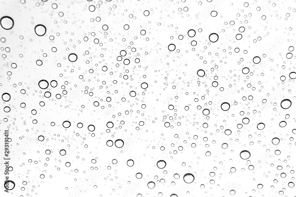 Rain drops on window glasses surface Natural Pattern of raindrops. Natural pattern of raindrops on white background for your design. Rain drops on window glasses surface Natural Pattern of raindrops. Natural pattern of raindrops on white background for your design.
