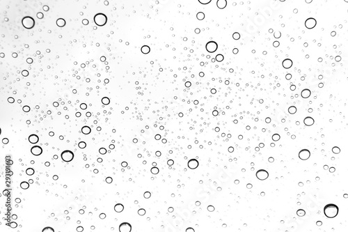 Rain drops on window glasses surface Natural Pattern of raindrops. Natural pattern of raindrops on white background for your design.