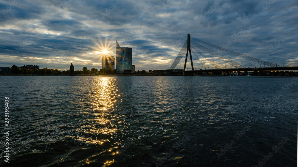 panoramic view of Riga city in Latvia. Capital of Latvia at nightfall with red sunset