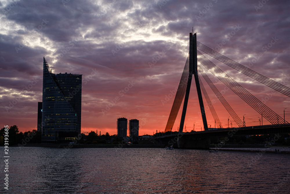 panoramic view of Riga city in Latvia. Capital of Latvia at nightfall with red sunset panoramic view of Riga city in Latvia. Capital of Latvia at nightfall with red sunset