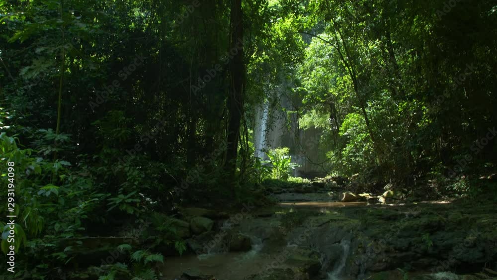 Amazing Unseen Waterfall view in deep forest Lush green leafes and sunshine in the morning. Saraburi Asia Thailand Amazing Unseen Waterfall view in deep forest Lush green leafes and sunshine in the morning. Saraburi Asia Thailand