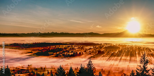 Sunrise over cloud inversion covering Fraser Valley