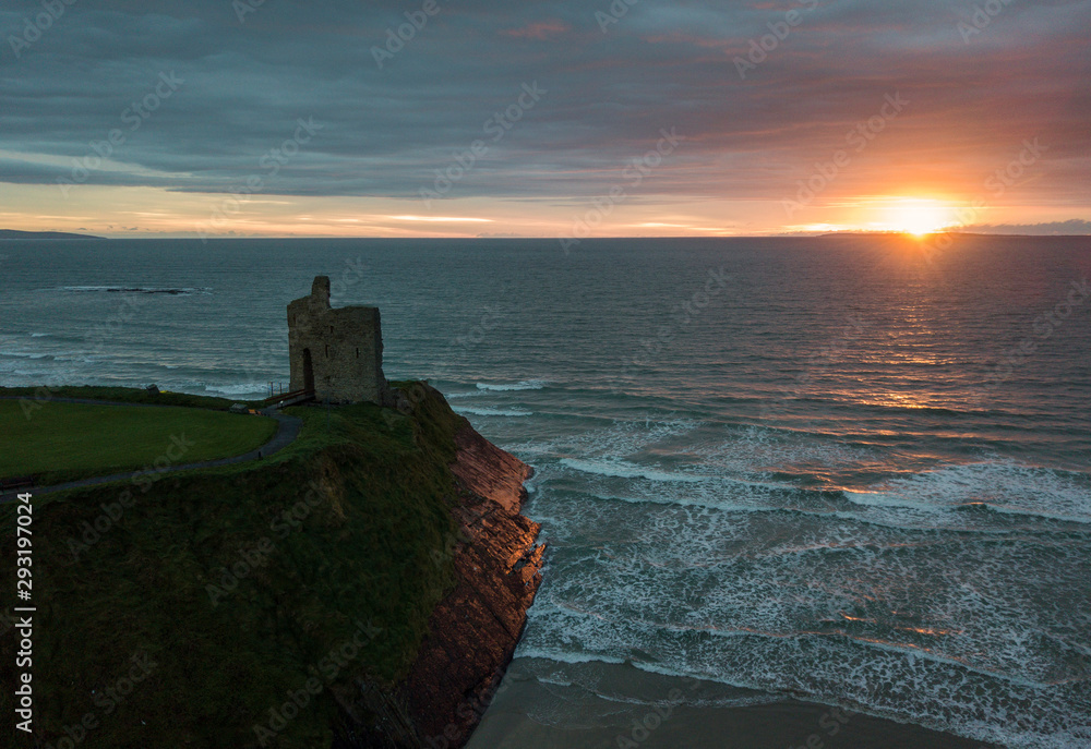 Ballybunion Castle ruins aerial view at sunset. Co. Kerry, Ireland. April 2019