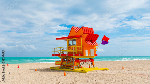 Colorful lifeguard tower under a cloudy sky in Miami Beach, © Gabriele Maltinti