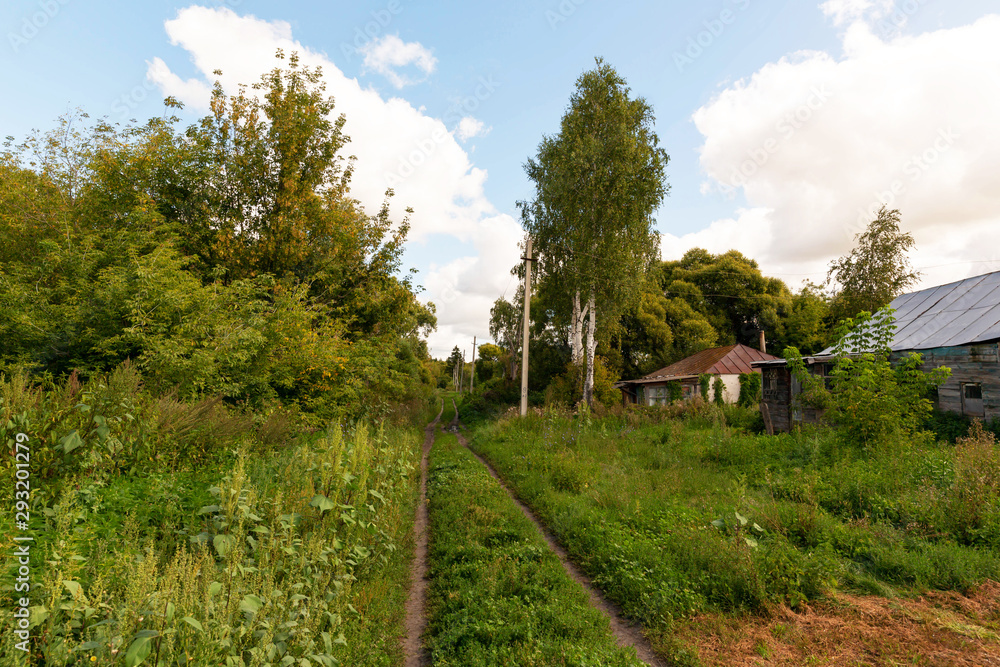 Rural, summer view of an ancient village in Central Russia. Rural, summer view of an ancient village in Central Russia.