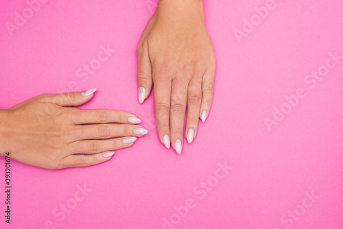 Stylish trendy female manicure. Beautiful woman s hands on soft background.