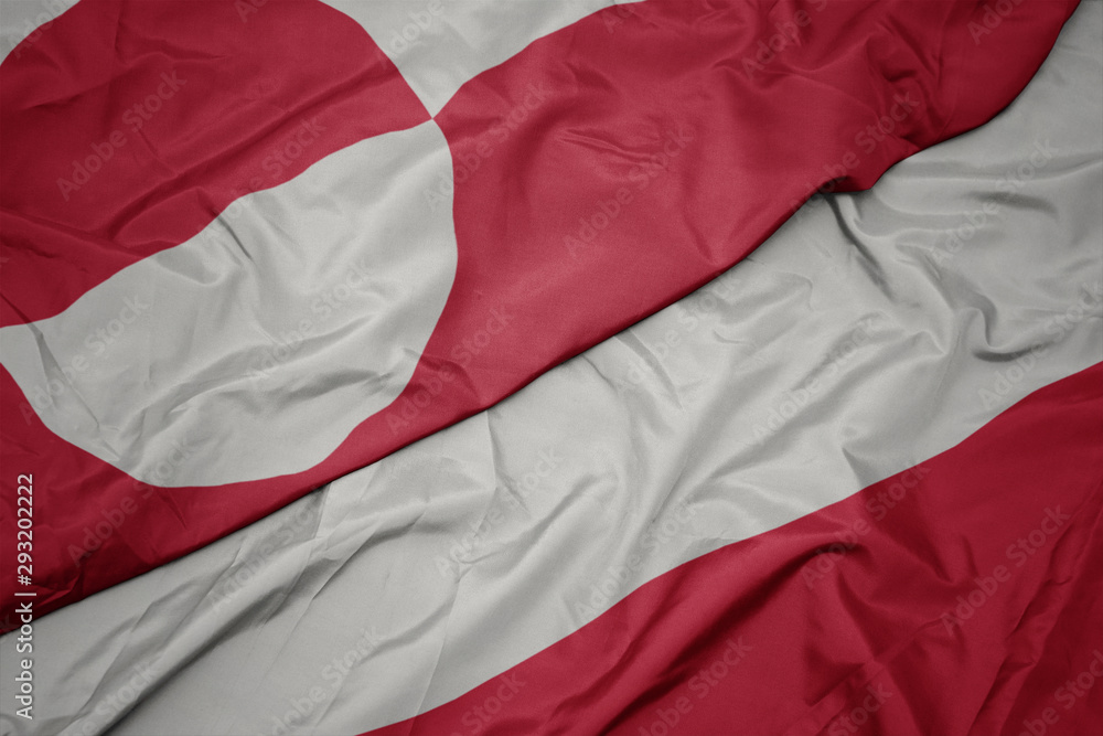 waving colorful flag of poland and national flag of greenland. waving colorful flag of poland and national flag of greenland.