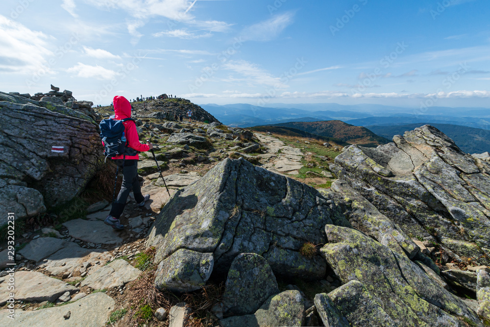 girl athlete on top of the mountain.