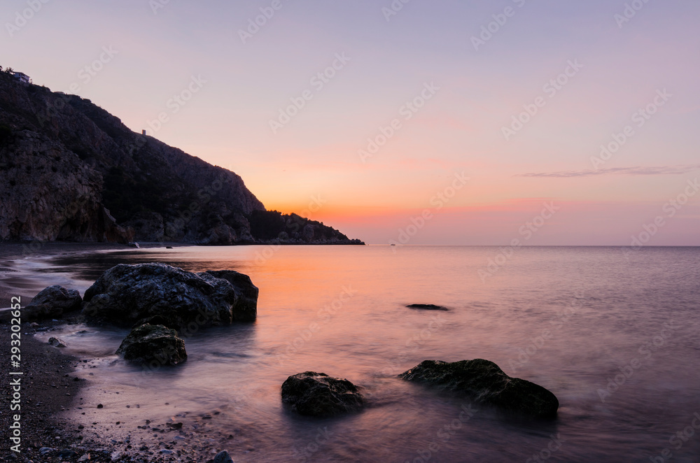 First hours of the day at Cantarrijan beach, the best nudist beach on