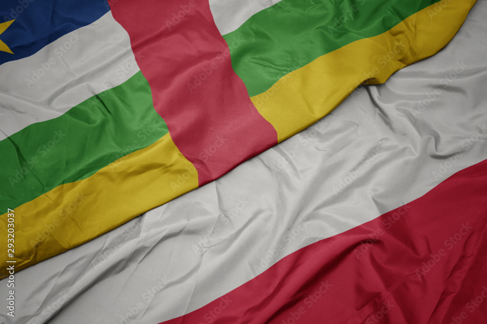 Obraz premium waving colorful flag of poland and national flag of central african republic.