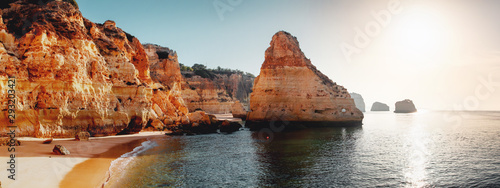 One of the must visit spot at the famous coastline with rocks and beautiful beaches at sunset light Praia da Marinha, Famous Beach, Algarve Coast, Lagoa, Portimao in South Portugal, Atlantic Ocean