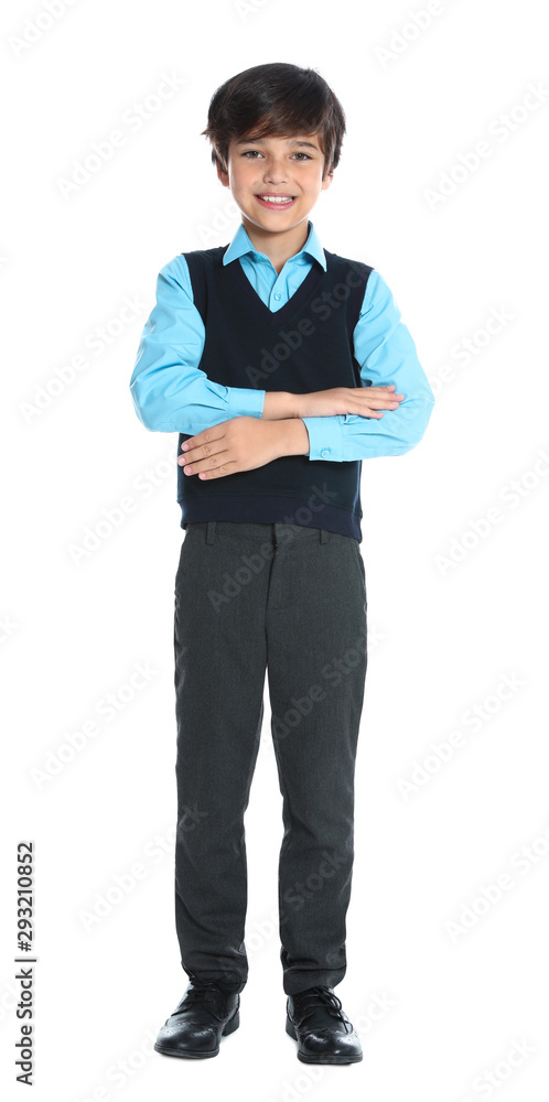 Happy boy in school uniform on white background