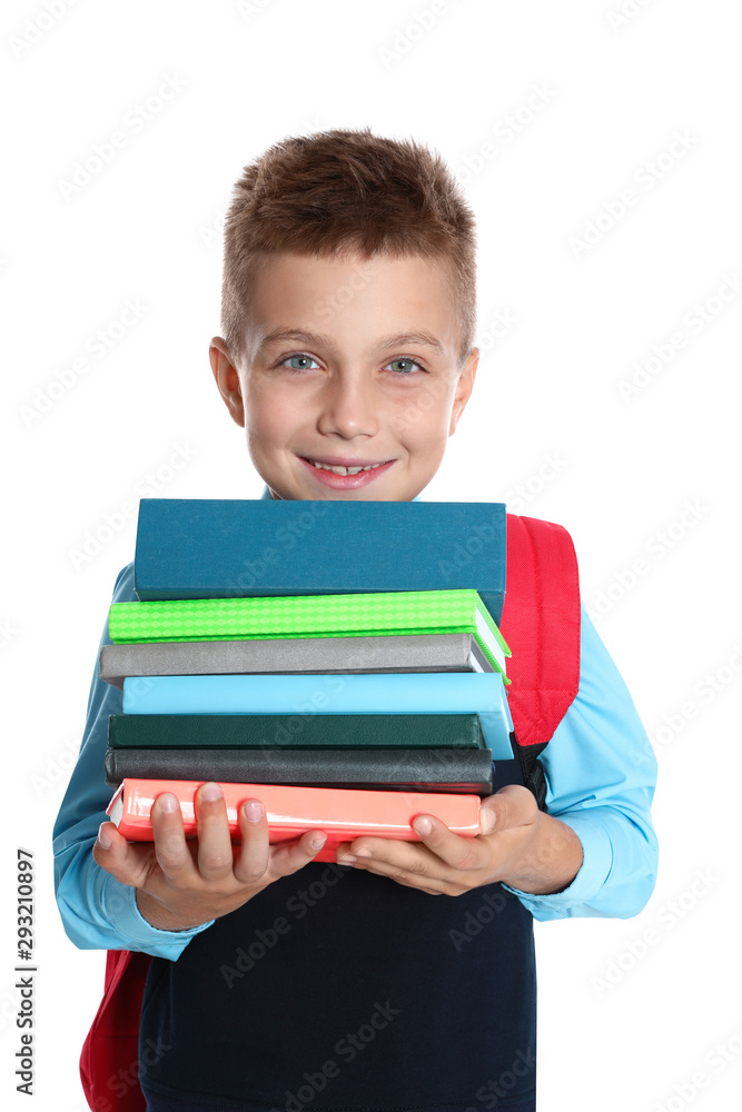 Happy boy in school uniform with stack of books on white background Happy boy in school uniform with stack of books on white background