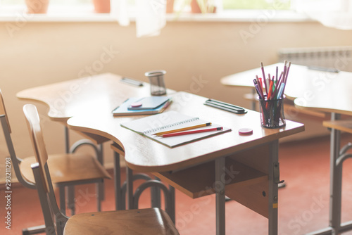 School desk with pen, notepad © iwavephoto
