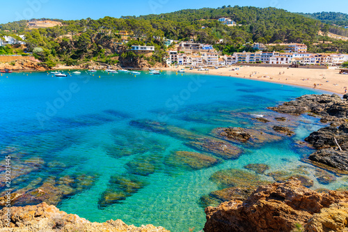 View of bay with azure sea water in beautiful Sa Riera village, Costa Brava, Catalonia, Spain © pkazmierczak