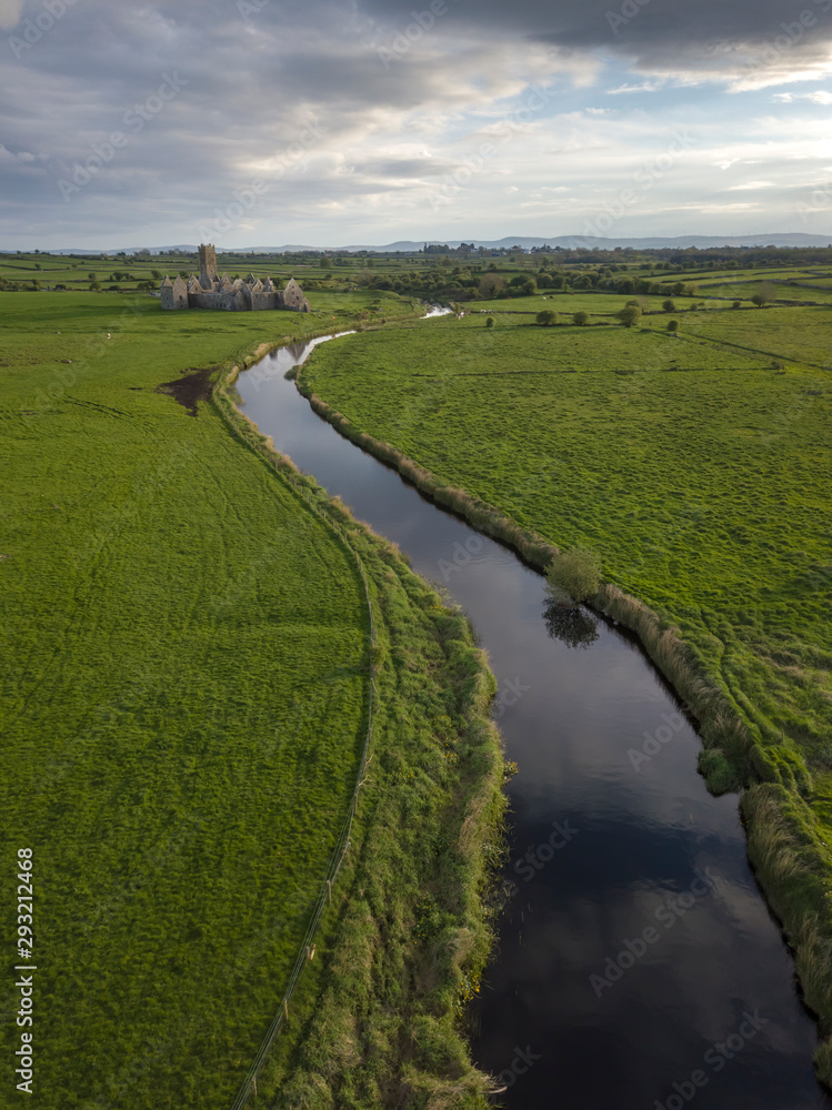 Ross Errilly Friary aerial view with river in the foreground. Co. Galway, Ireland. April, 2019