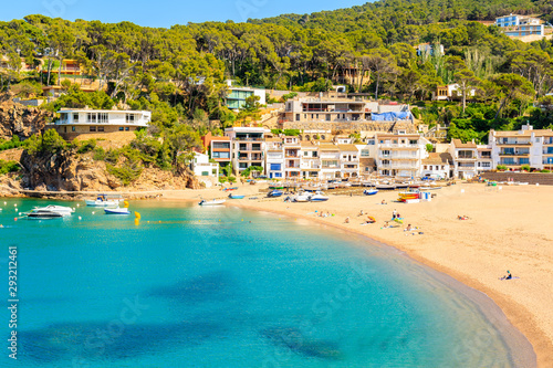 View of Sa Riera beach and fishing village in background, Costa Brava, Catalonia, Spain © pkazmierczak