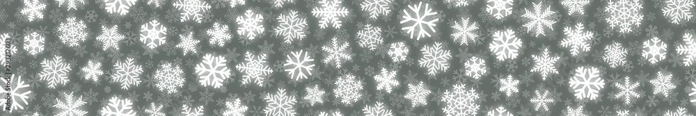 Christmas horizontal seamless banner of white snowflakes on gray background