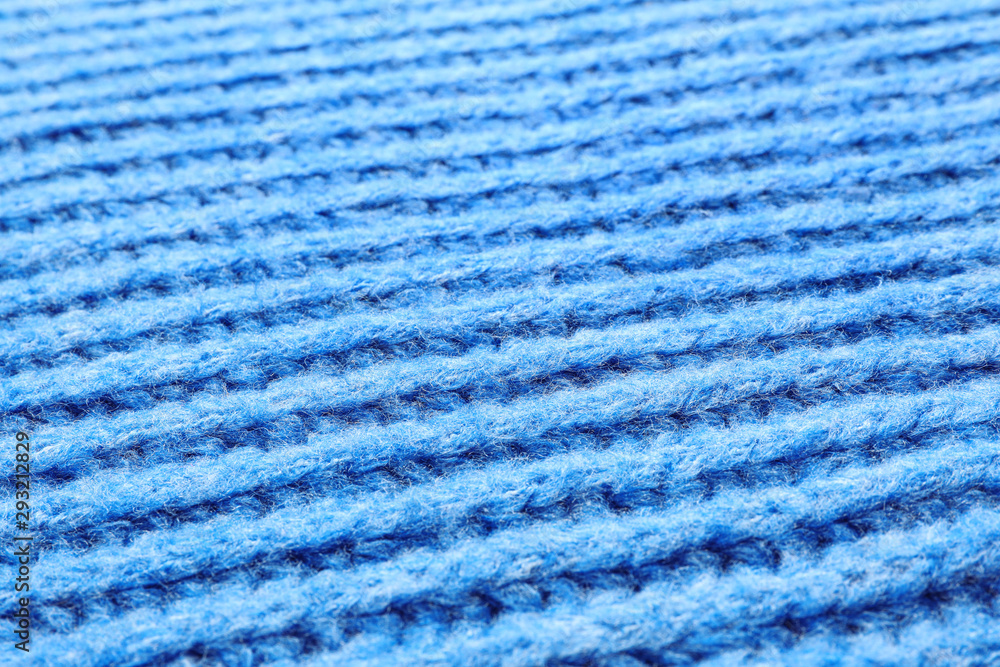Blue winter sweater as background, closeup view Blue winter sweater as background, closeup view