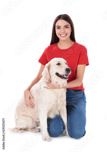 Young woman and her Golden Retriever dog on white background