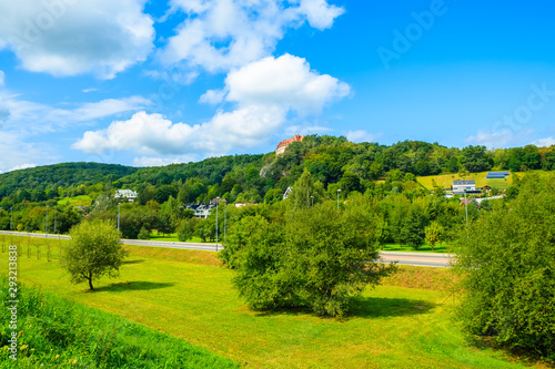 View of green landscape in Krakow city with castle on hill, Poland