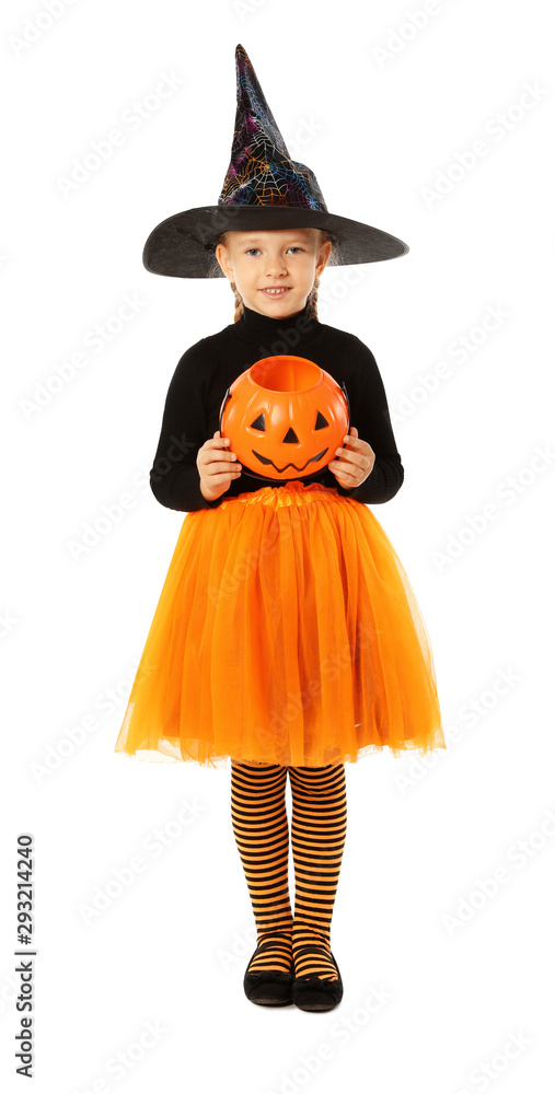 Cute little girl with pumpkin candy bucket wearing Halloween costume on white background