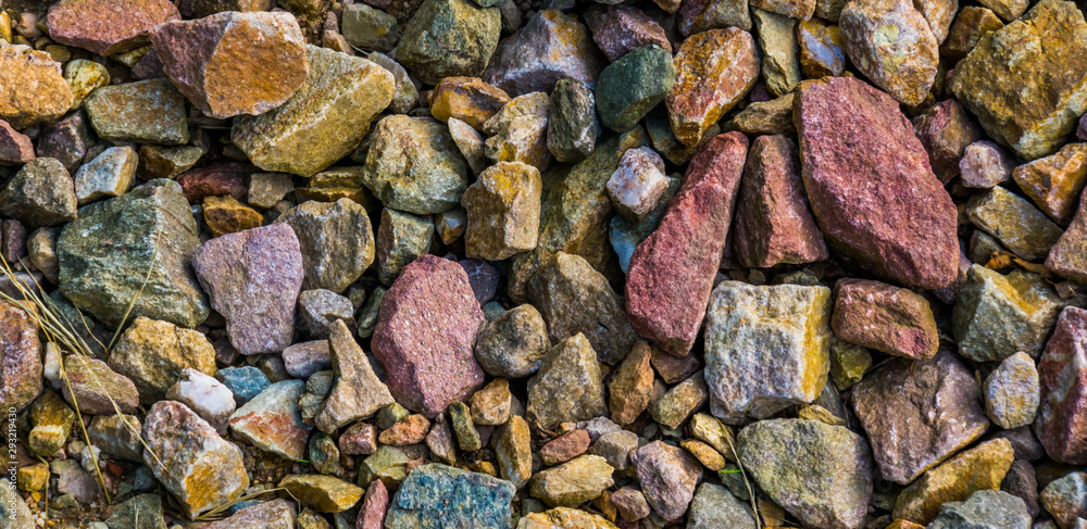 gravel stones in diverse colors in closeup, stone pattern background <span>plik: #293219430 | autor: Charlotte B</span>