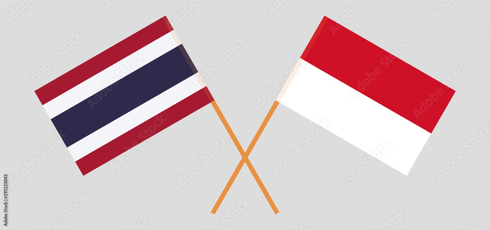 Thailand and Indonesia. Crossed Thai and Indonesian flags