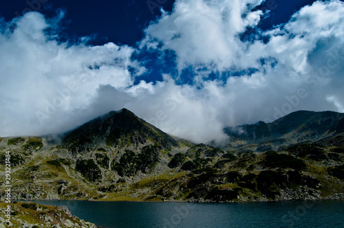 High-altitude landscape with glacier lakes from the Retezat Peak of the Carpathian Mountains 