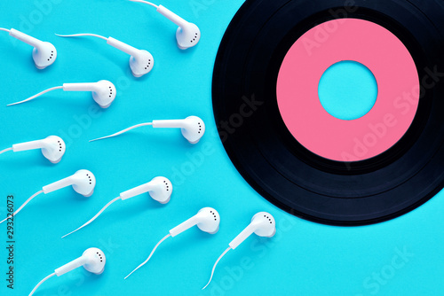 Earphones shaped like sperm cells racing to the vinyl record
